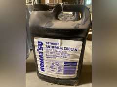 (4) 1 GALLON JUGS KOMATSU COOLANT - PARTS