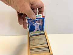 Small container of unsearched sports cards, see pictures for details.