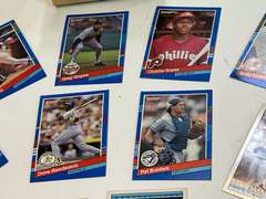 Small container of unsearched sports cards, see pictures for details.