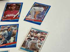 Small container of unsearched sports cards, see pictures for details.