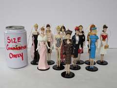 Collection of Barbie Ornament Dolls
