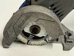 Dremel cordless ultrasaw, no battery, no charger, see pictures or details.