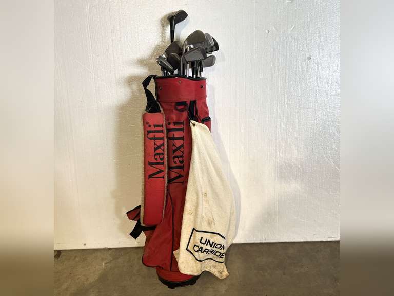 Golf bag with assorted clubs and drivers to include Excalibur and Mizuno, see pictures for details. image