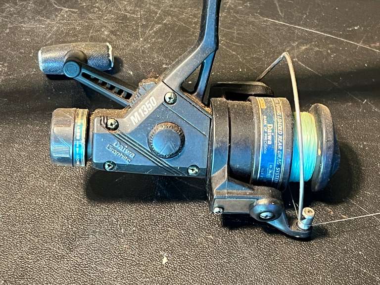 S2…Hurricane fishing pole with Daiwa M1350 open reel, see pictures for details. image