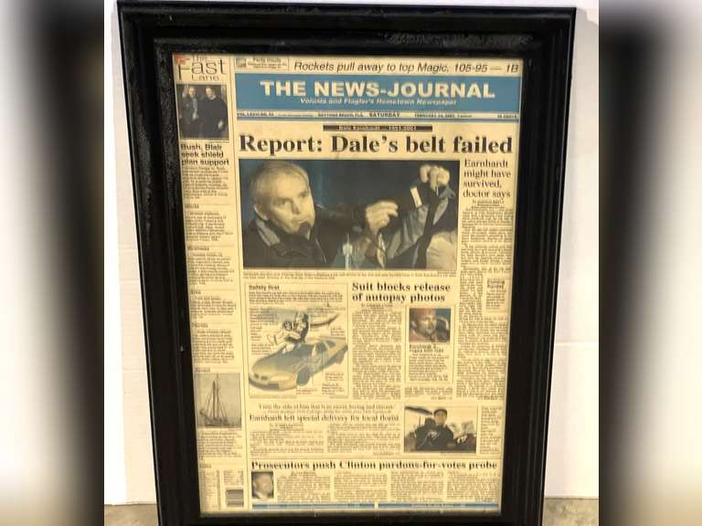 Framed Daytona Beach News Journal featuring story on Dale Earnhardt’s death, see pictures for details. image
