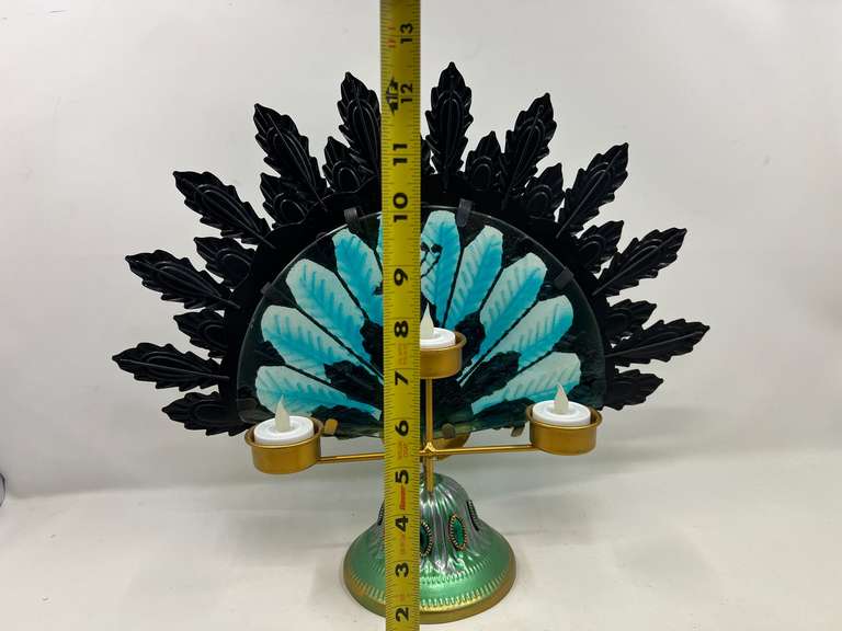 LR… Peacock tea light holder, see pictures for details.