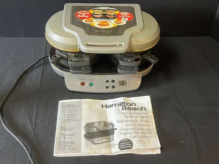 KIT… Hamilton Beach dual breakfast sandwich maker, powers up, see pictures for details. image
