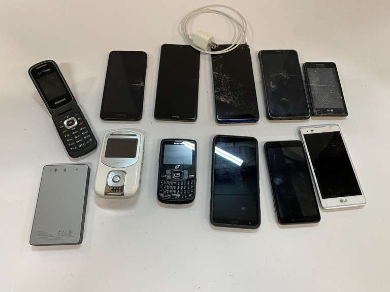 Cell phone assortment, tub is not included, see pictures for details. image