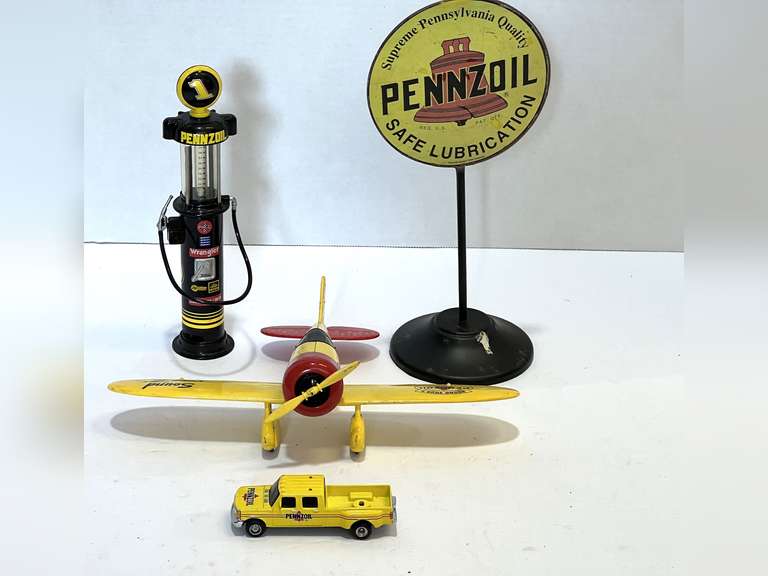Diecast replicas to include Pennzoil propeller plane, service truck, desktop sign, and vintage gas pump. see pictures for details. image