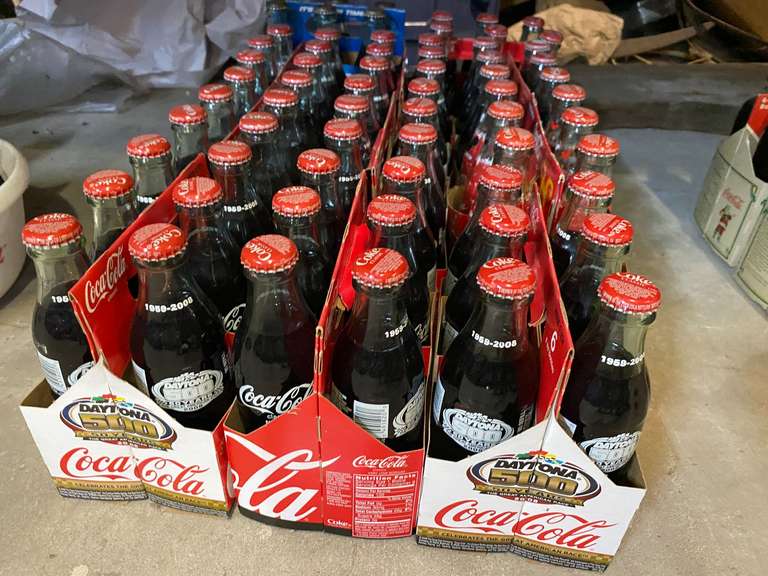 Commemorative Coca-Cola’s, 8 ounce, 11 6-packs, see pictures for details. image