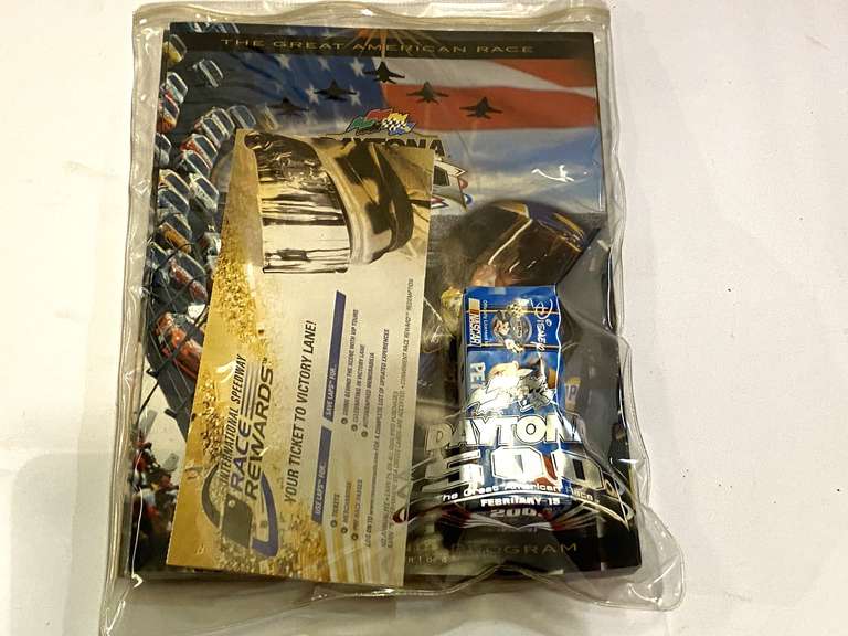 Daytona 500 souvenir program, starting lineup, and Disney Daytona 500 miniature diecast replica, see pictures for details. image