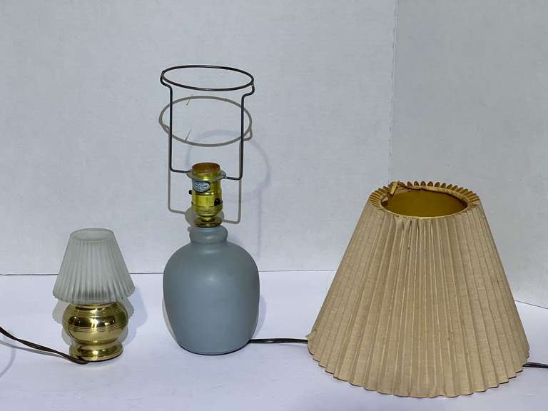 Mini desk lamps, one has a brass finish, see pictures for details. image