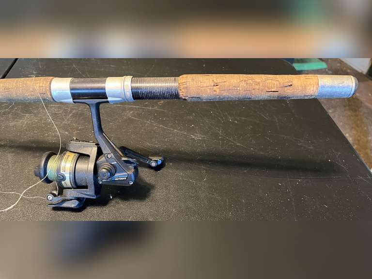 S2…Fishing pole with Daiwa Long Cast X open reel, see pictures for details. image