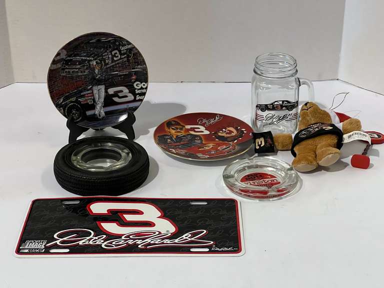 Assorted racing memorabilia to include tire ashtray, Dale Earnhardt limited edition collector plates, two pieces, Dale Earnhardt mug, and ornament, and more. See pictures for details. image