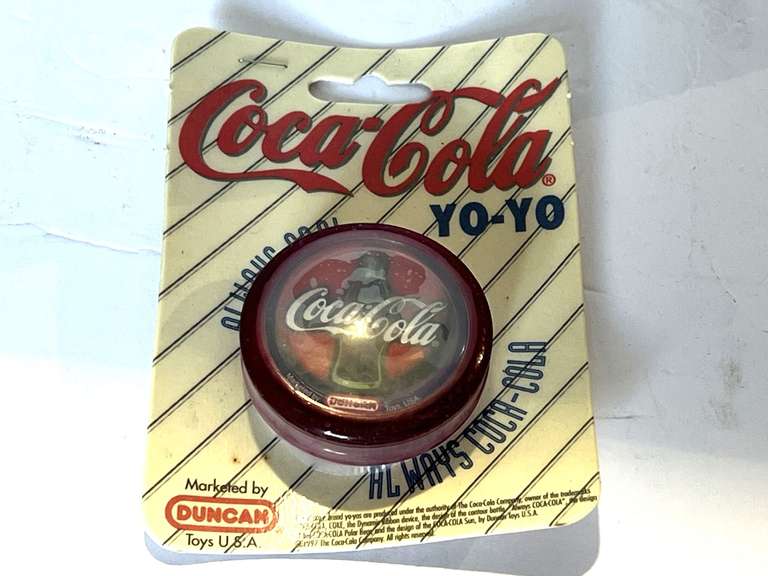 Coca-Cola yo-yo, still in original packaging, see pictures for details. image