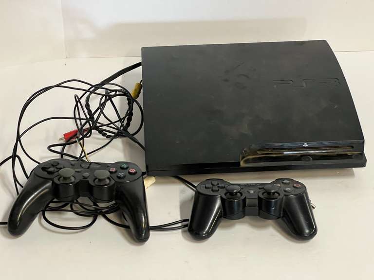 PlayStation 3 with two controllers, working condition unknown, see pictures for details. image