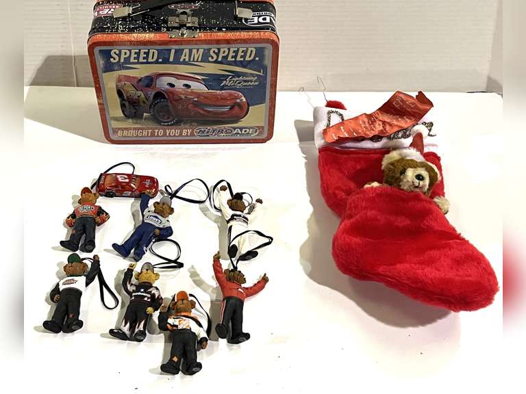 Lightning McQueen lunchbox with content of assorted ornaments, also includes a Christmas stocking, see pictures for details. image