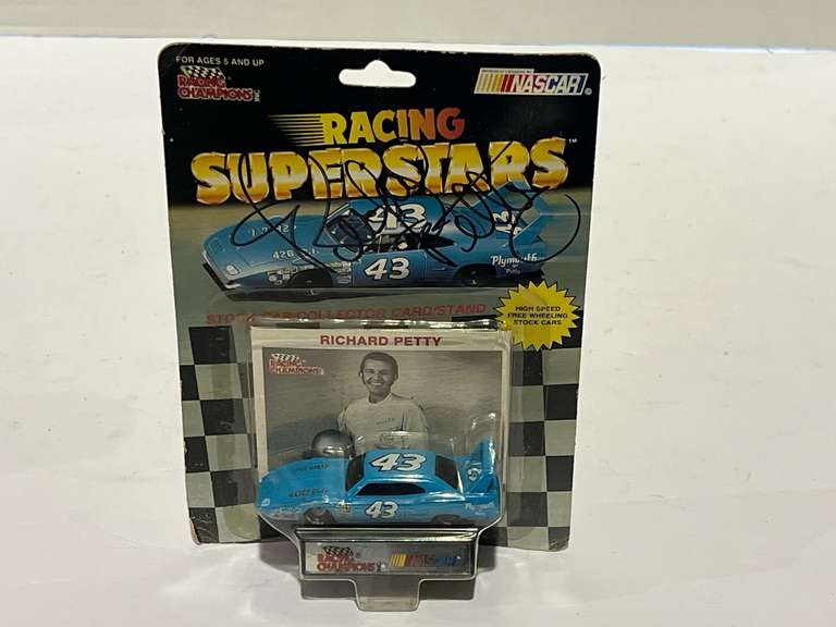 Richard Petty, #43, diecast stock car replica, still in original packaging, has a Richard petty signature on the package, (not authenticated), see pictures for details. image