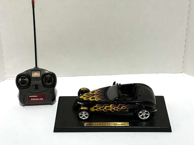 Plymouth Prowler diecast replica, with stand, also includes a Radio Shack Prowler control, see pictures for details. image