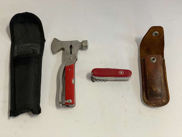 Swiss Army knife with sheath, also includes a multitool with sheath, tub is not included, see pictures for details. image