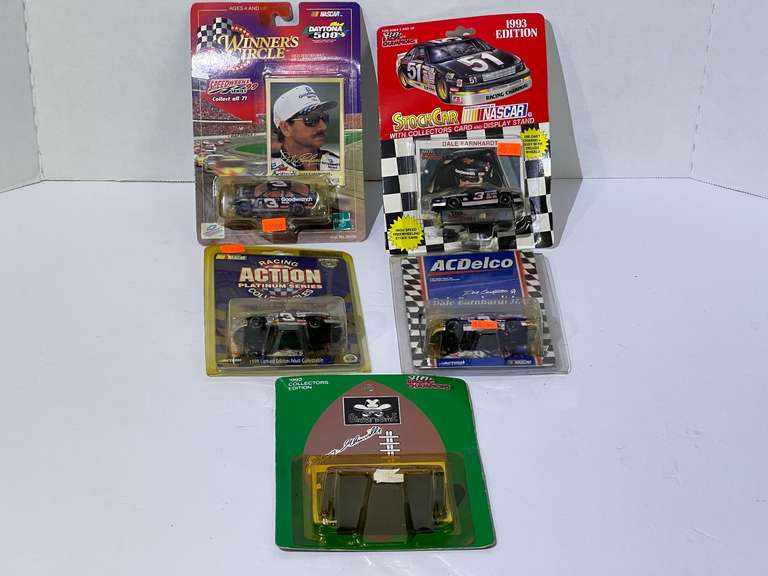 Assorted diecast stock car miniature replicas, featuring Dale Earnhardt, and Jerry Glanville five pieces, all pieces are still in original packaging, see pictures for details. image