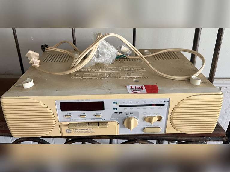 Garage… GE spacemaker, AMFM stereo cassette player, this piece powers up, see pictures for details. image
