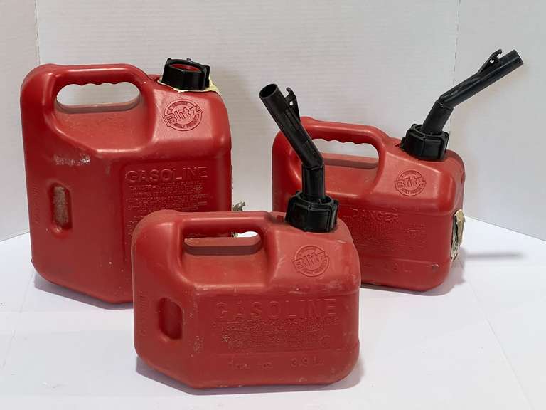 Gas cans, three pieces, one is missing the spout, see pictures for details. image