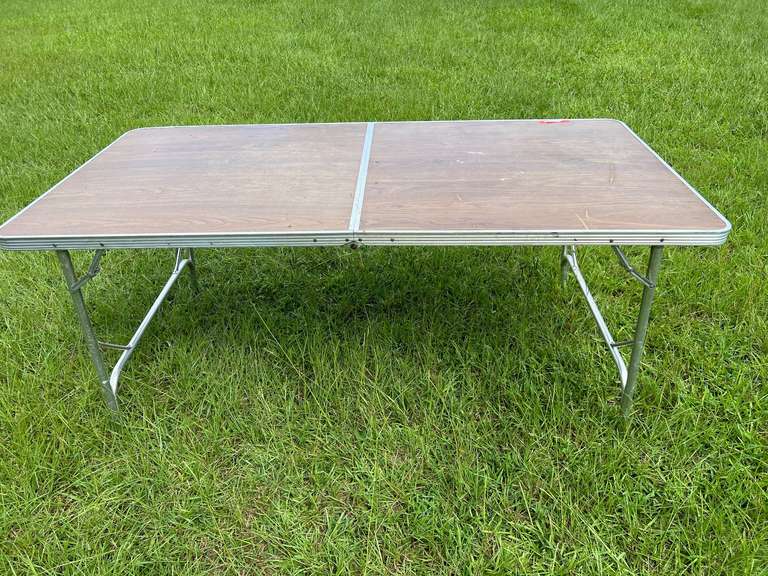 S2…Two portable tables, aluminum and wood, both are 6’, see pictures for details. image