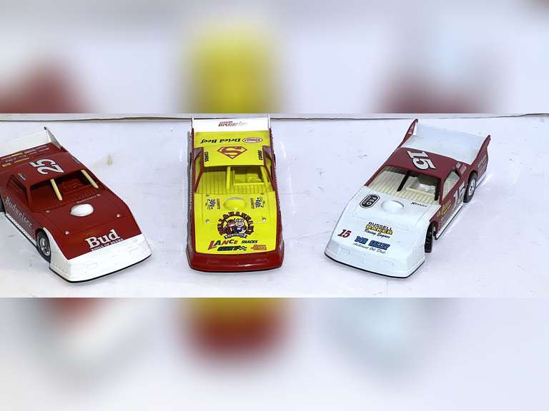 Diecast dirt car replicas, three pieces, see pictures for details. image