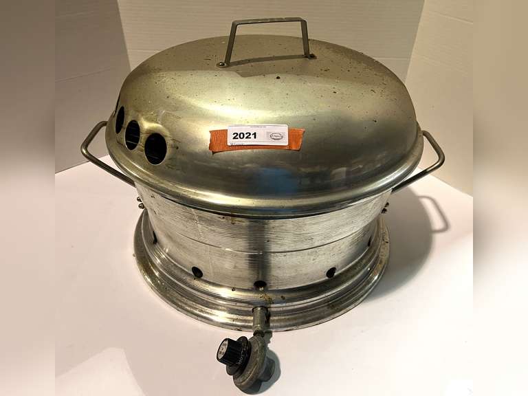 Unique car rim gas grill with lid, see pictures for details. image
