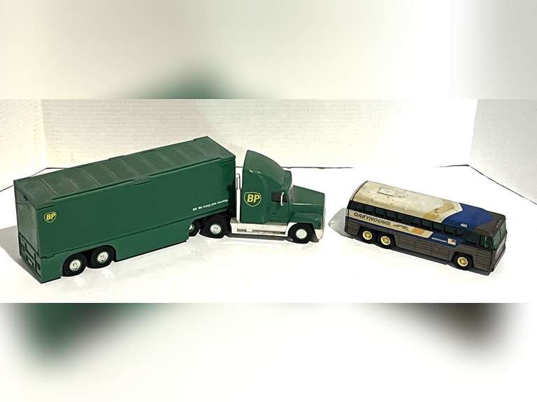 Collectible BP semi truck race car carrier replica, also includes a vintage metal diecast Greyhound bus replica, see pictures for details. image