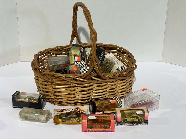 Basket of assorted diecast stock car miniatures, most are in original packaging, see pictures for details. image