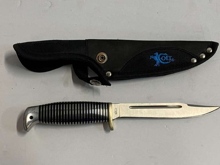 Colt knife with sheath, see pictures for details. image