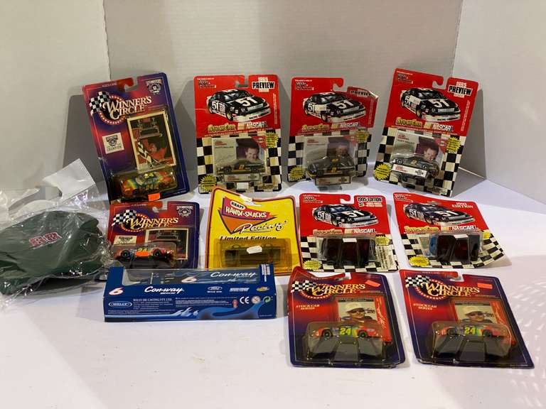 Assorted diecast stock car miniature replicas, still in original packaging, and more, includes basket, see pictures for details. image