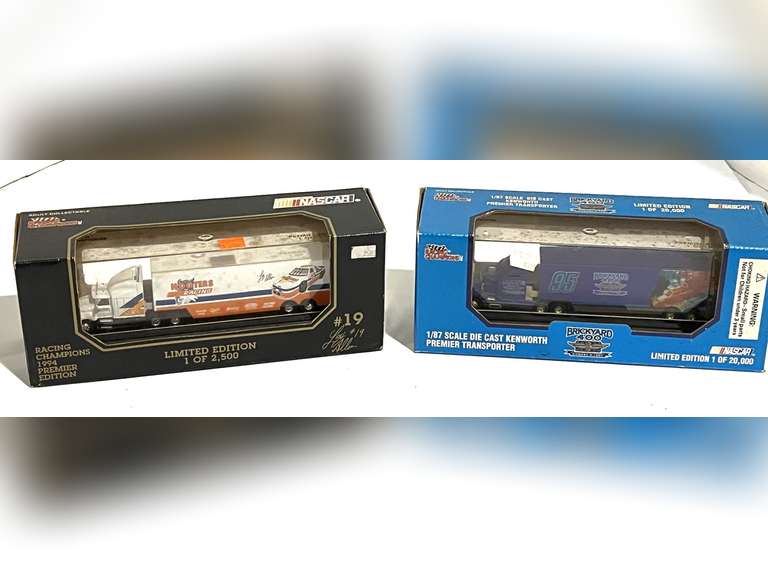 Collectible diecast racing transport replicas, both are still in original boxes, see pictures or details. image