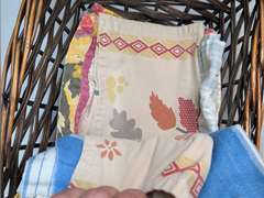 BASKET FILLED WITH THEMED DISH RAGS