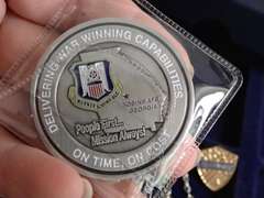 COIN COLLECTOR BOX & CONTENTS - INCLUDES HEAVY METAL SHERIFF BADGE, CROSS NECKLACE, C-5 AIR FORCE MEDALLION & MORE
