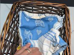 BASKET FILLED WITH THEMED DISH RAGS