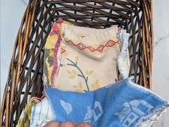 BASKET FILLED WITH THEMED DISH RAGS