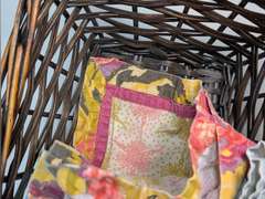 BASKET FILLED WITH THEMED DISH RAGS
