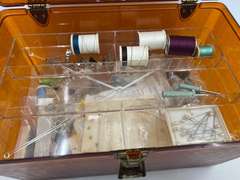 LR… Plastic sewing box with light content, see pictures for details.