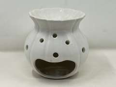 LR… Ceramic tea light/potpourri diffuser, see pictures for details.