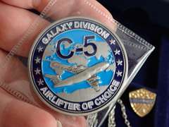 COIN COLLECTOR BOX & CONTENTS - INCLUDES HEAVY METAL SHERIFF BADGE, CROSS NECKLACE, C-5 AIR FORCE MEDALLION & MORE