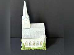 LR… Lighted ceramic music box church, needs new bulb, see pictures for details.