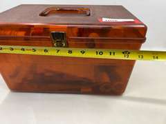 LR… Plastic sewing box with light content, see pictures for details.