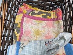 BASKET FILLED WITH THEMED DISH RAGS