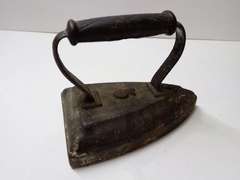 Ornate Primitive Clothes Iron