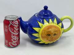 LR… World Bazaars sun face teapot, see pictures for details.