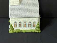 LR… Lighted ceramic music box church, needs new bulb, see pictures for details.