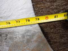 Cowhide Rug - See all photos for size.